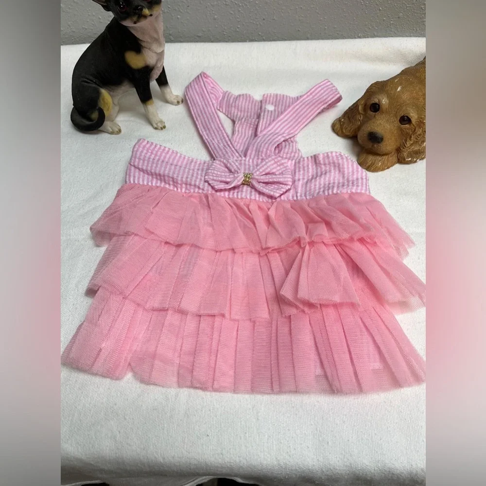 Pink and white striped ruffled dog dress with suspenders